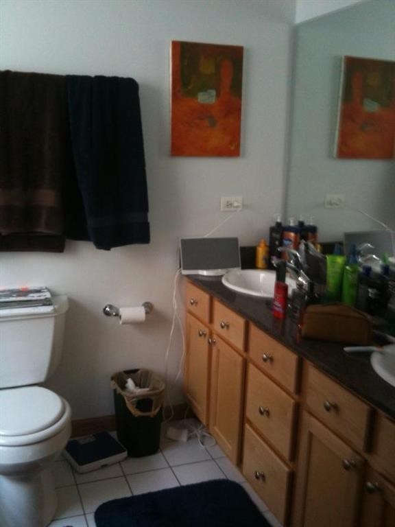 a bathroom with a toilet and a sink