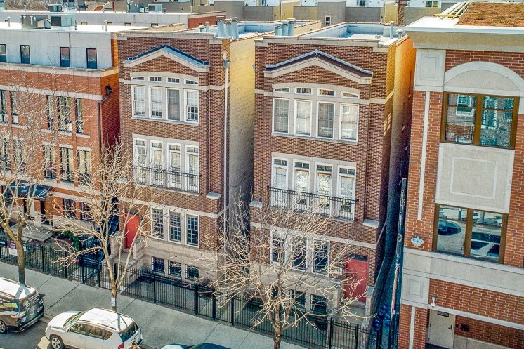 a view of a building from above of a street
