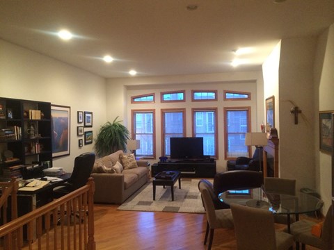 a living room with a couch and a tv