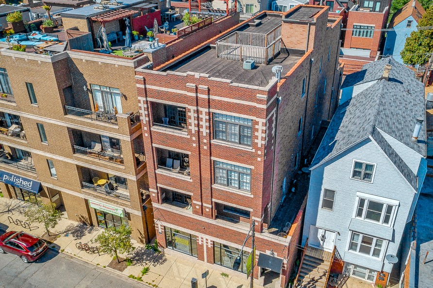a view from above of a brick apartment building