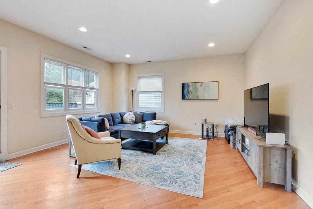 a living room with a couch and a tv
