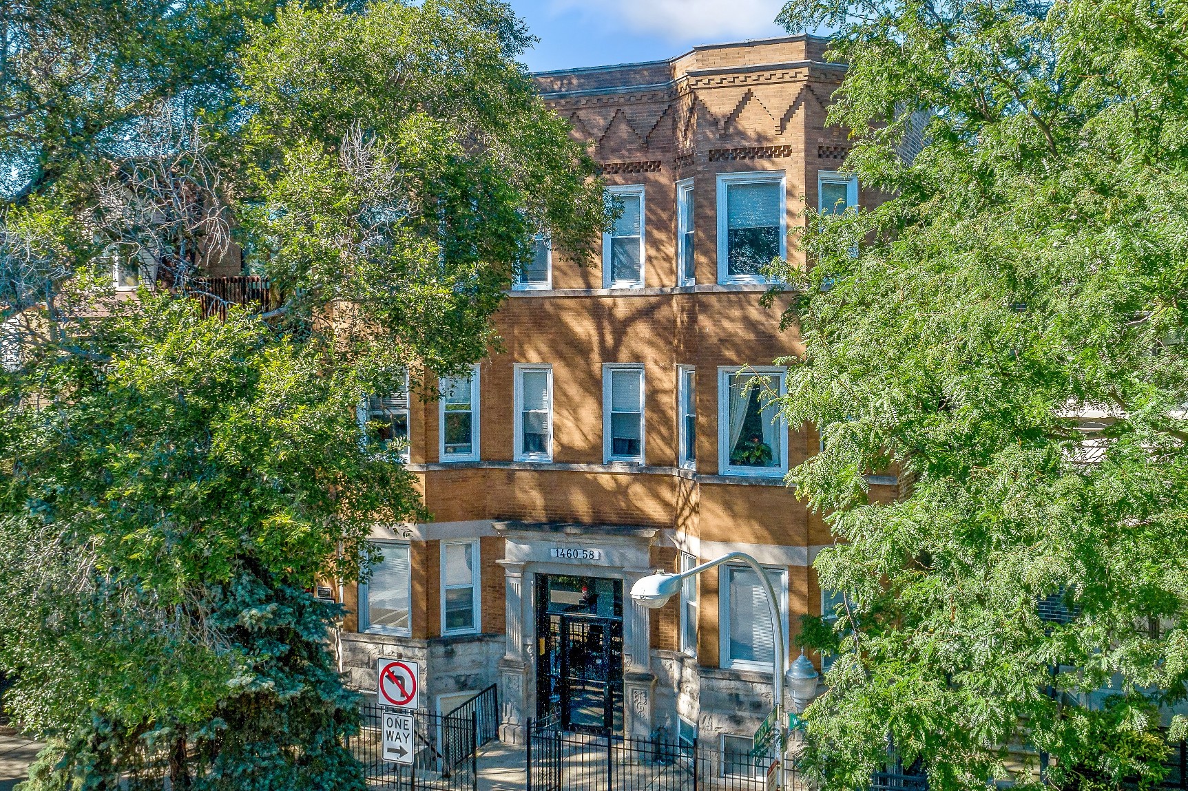 a building with trees in front of it
