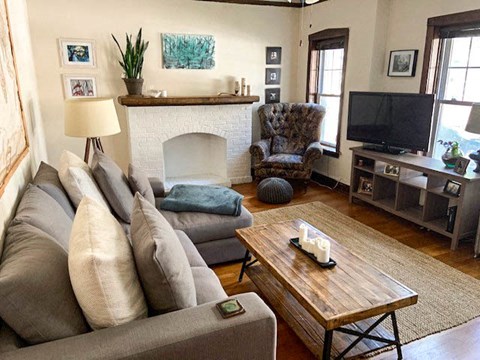 a living room with a couch and a television
