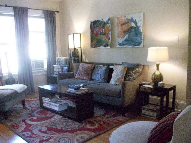 a living room with a couch and a table