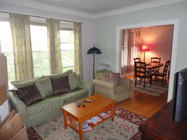 a living room with a couch and a coffee table