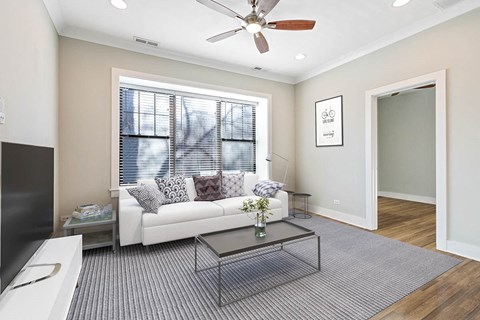 a living room with a couch and a coffee table