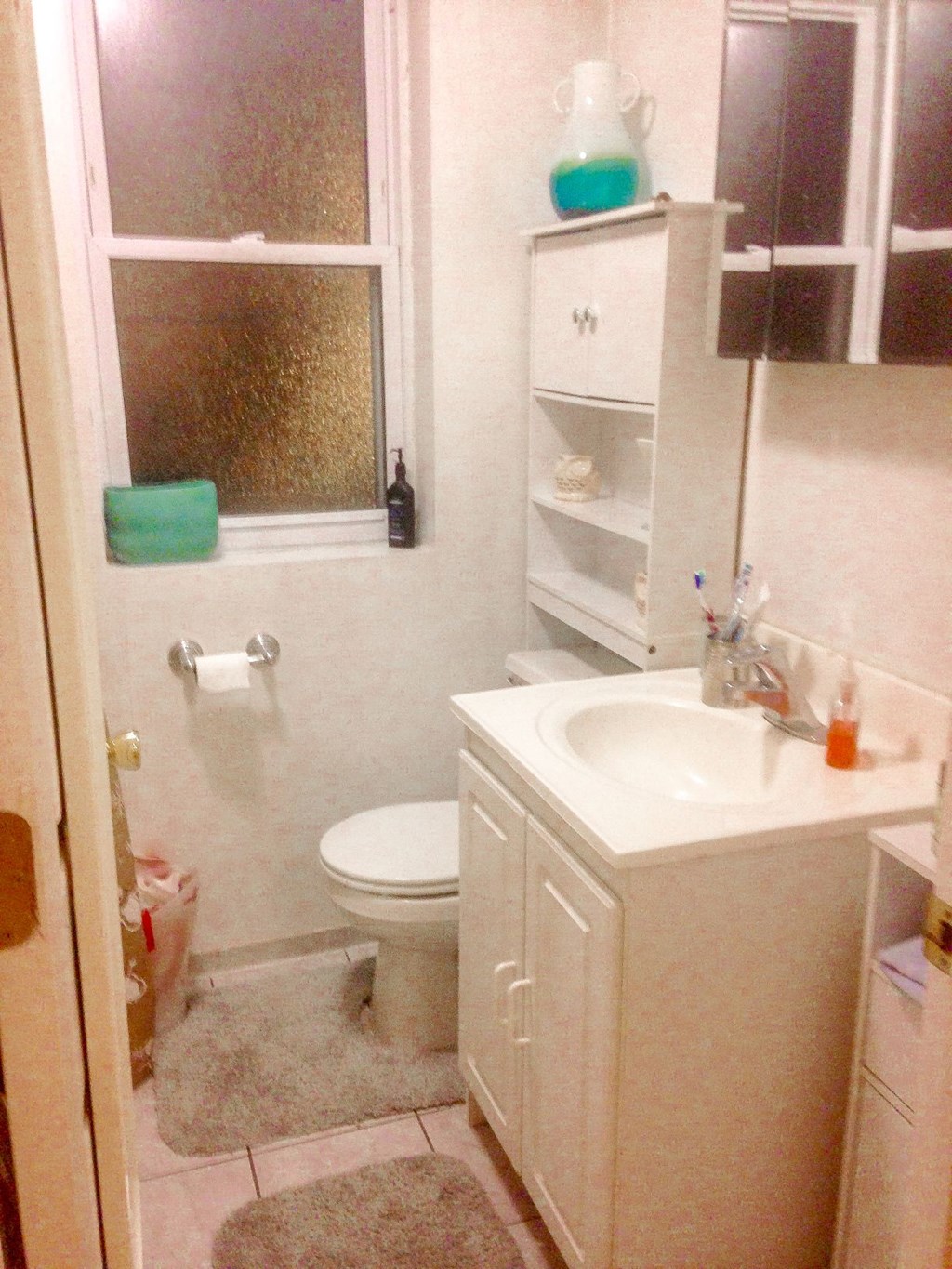 a small bathroom with a toilet and a sink