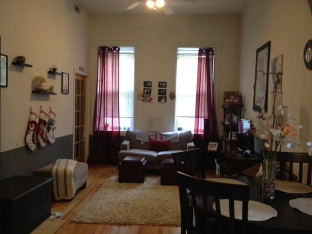 a living room with a couch and a table