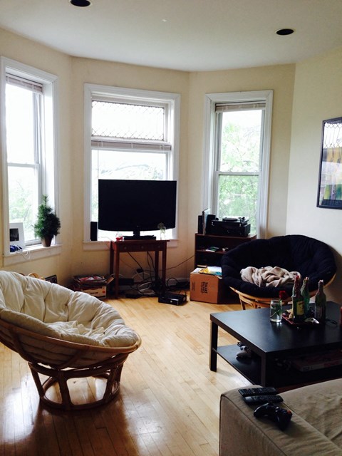 a living room with a couch and a television