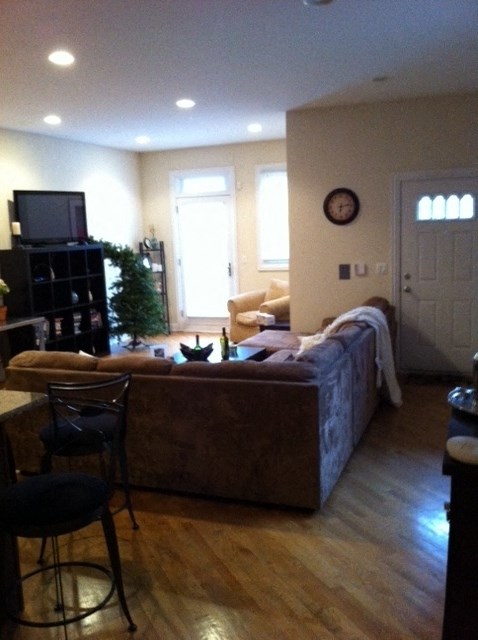 a living room with a couch and a tv
