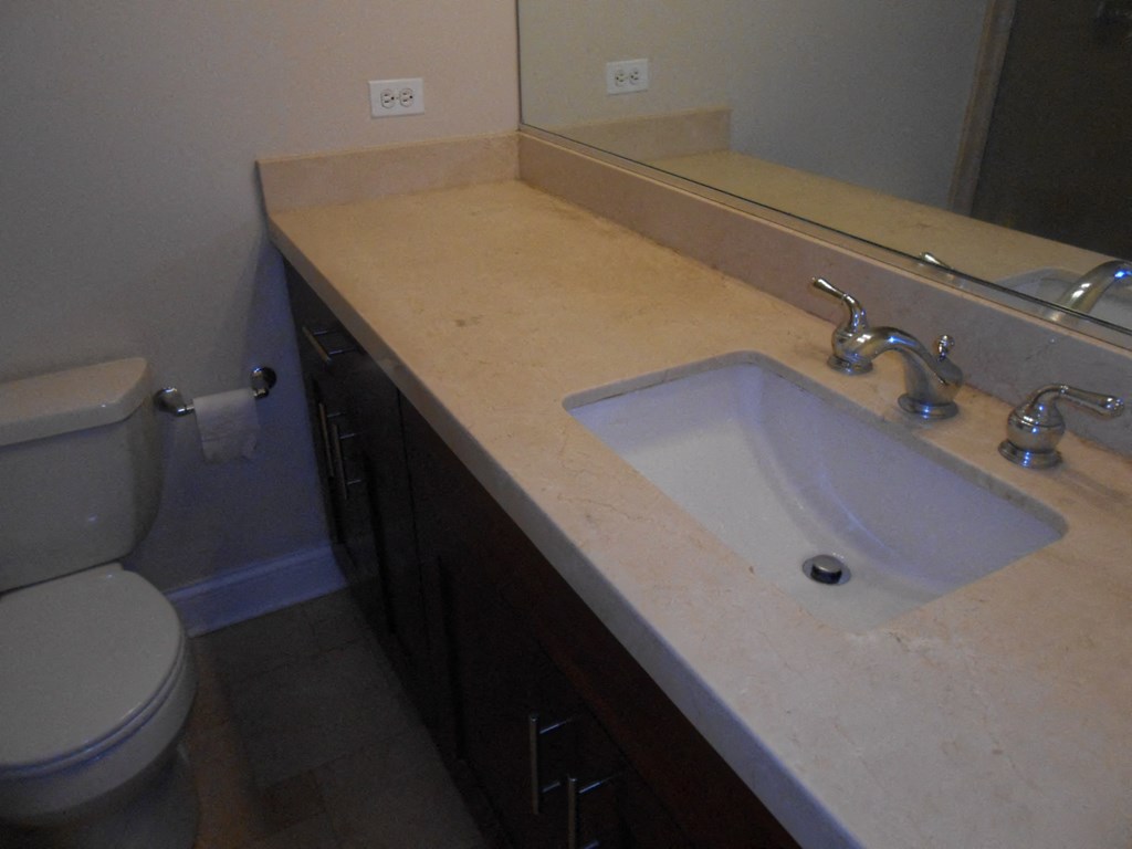 a bathroom with a sink and a toilet