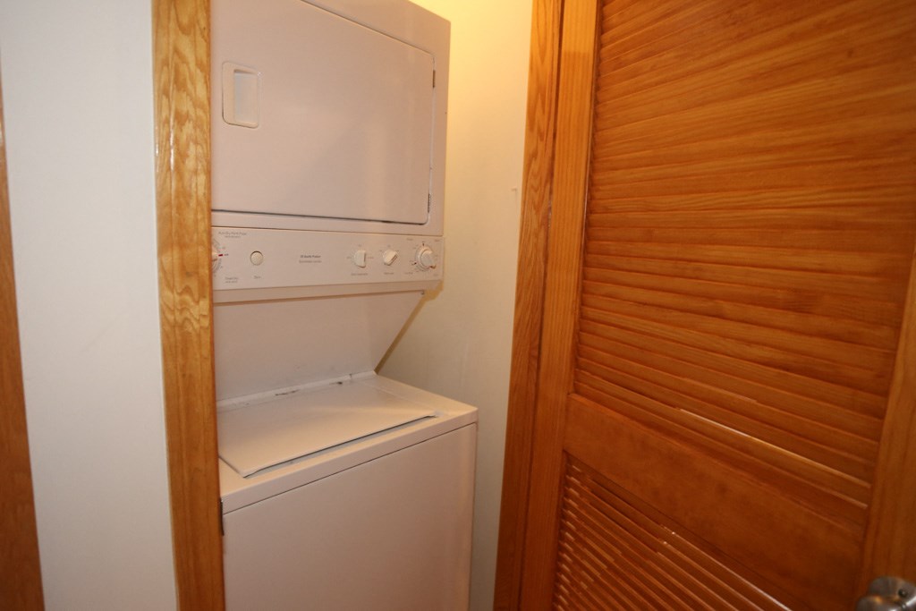 a small laundry room with a washer and dryer