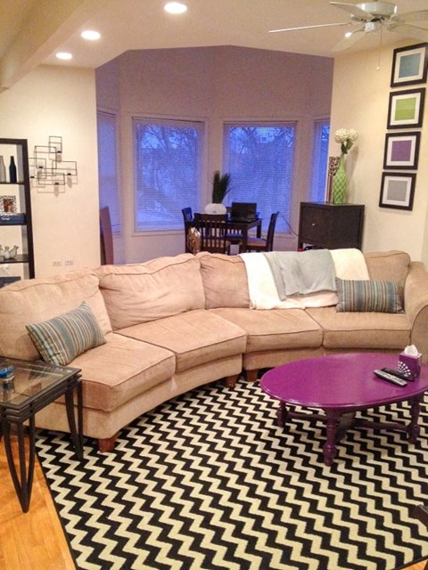 a living room with a couch and a coffee table