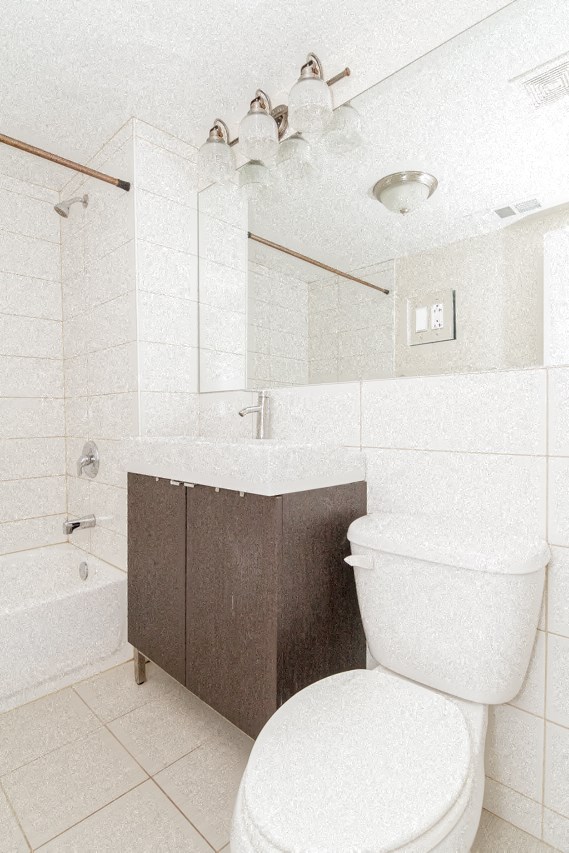 a bathroom with a toilet and a sink