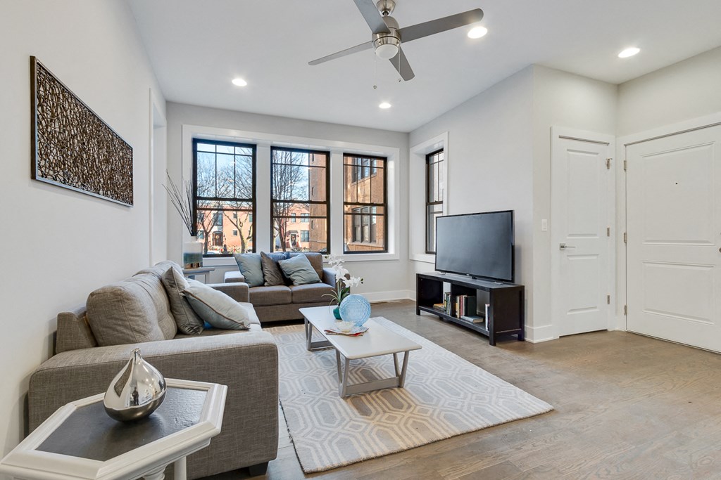 a living room with a couch and a tv