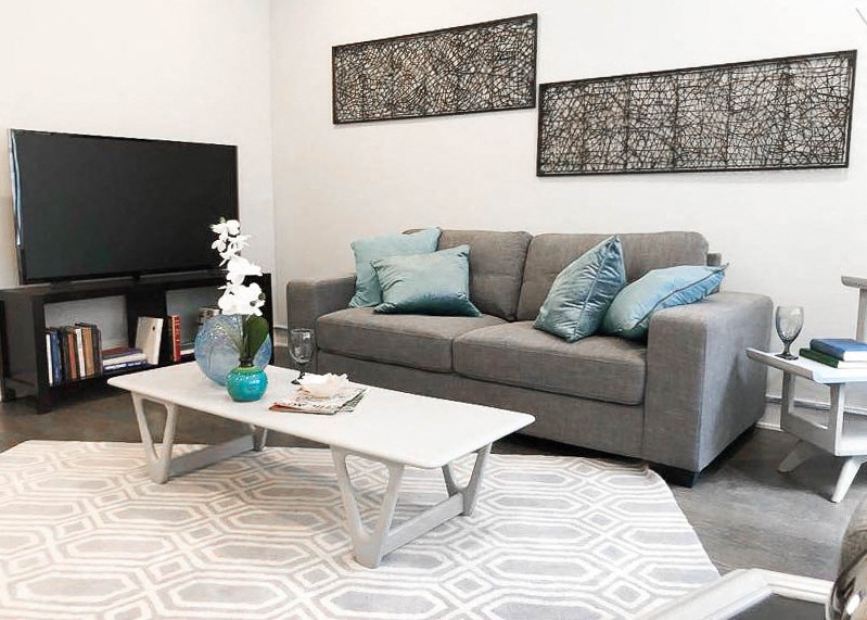 a living room with a couch and a television