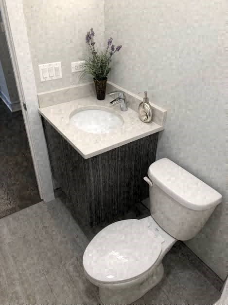 a small bathroom with a toilet and a sink