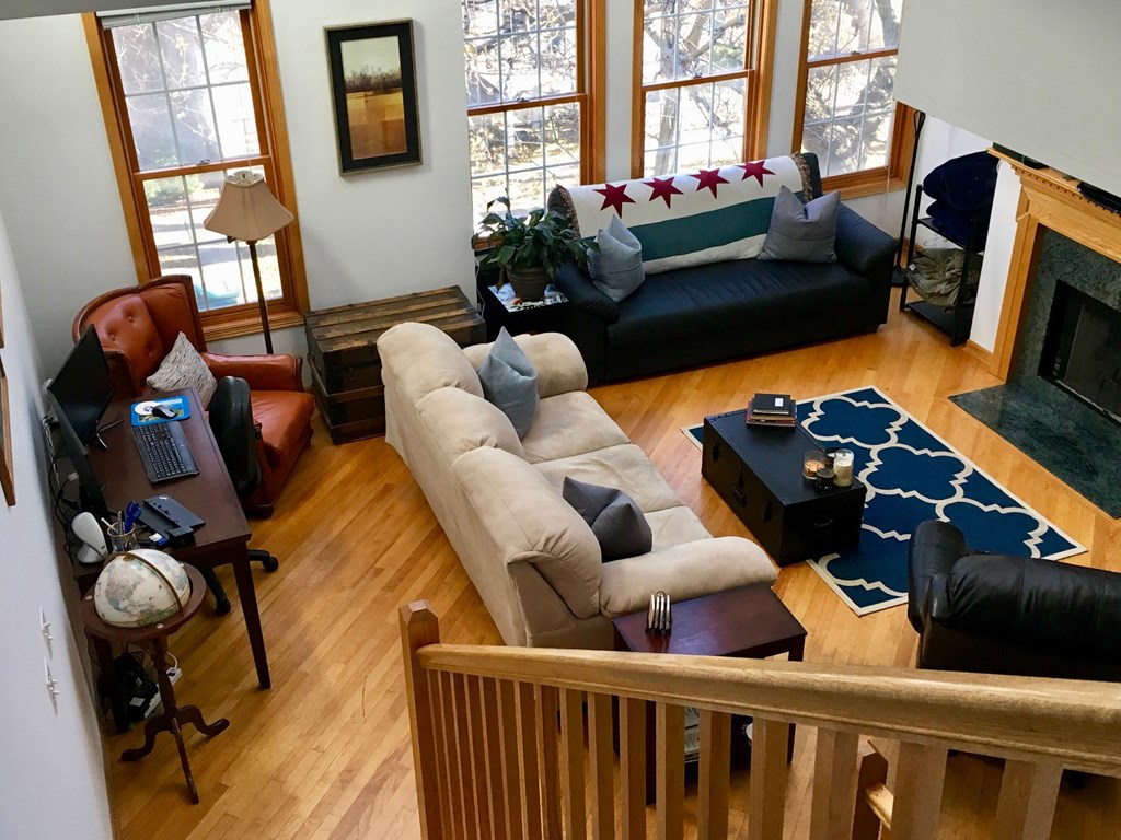 the view of the living room from the loft