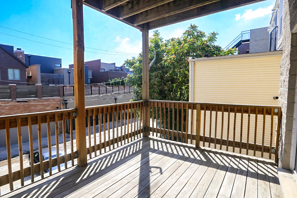 the deck has a view of the city and the trees