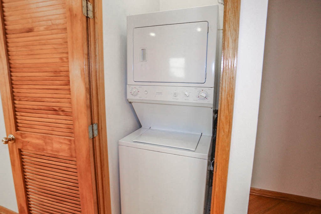 a small laundry room with a washer and dryer