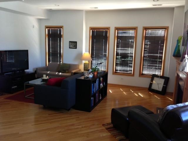 a living room with a couch and a tv