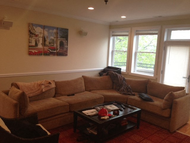 a living room with a couch and a coffee table