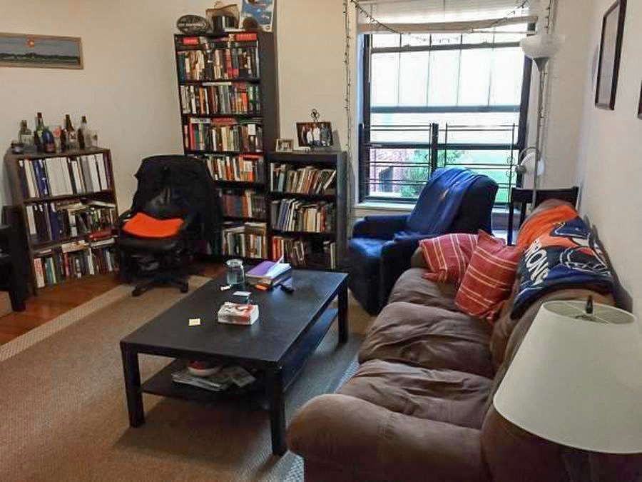 a living room with a couch and a coffee table