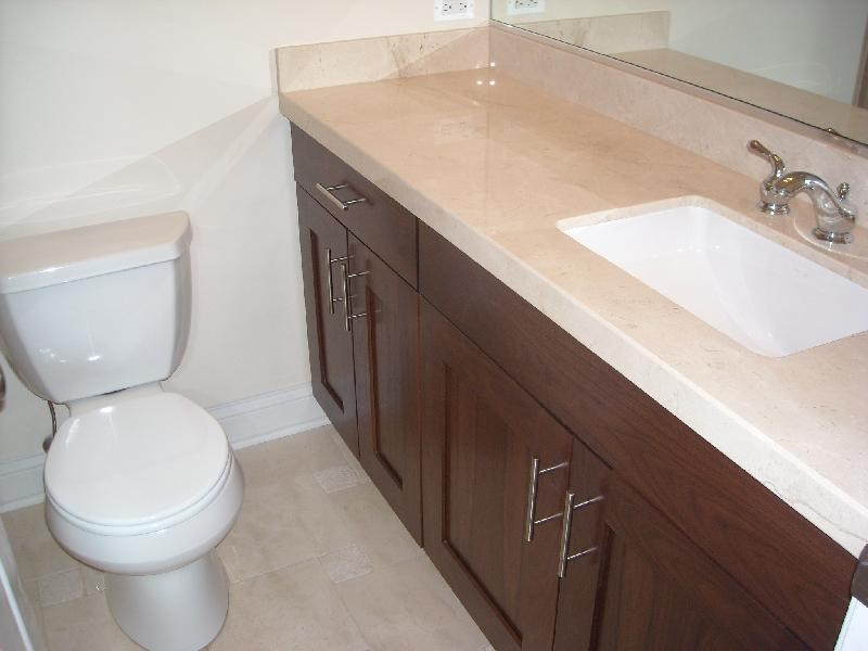 a bathroom with a toilet and a sink