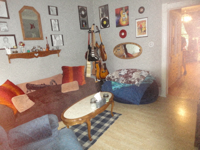 a living room with a couch and a table