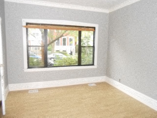 an empty room with a large window in it