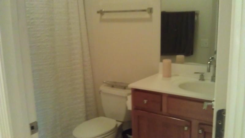 a bathroom with a toilet and a sink