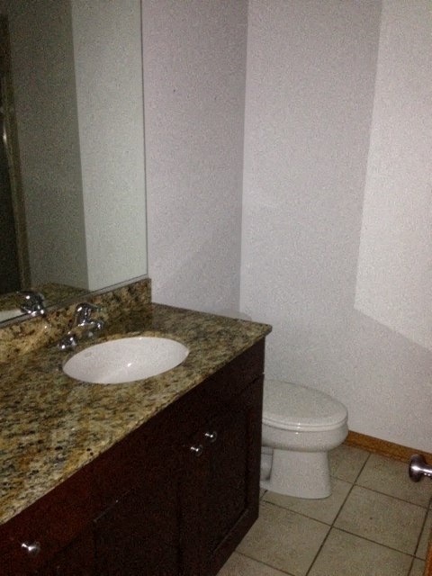 a bathroom with a sink and a toilet