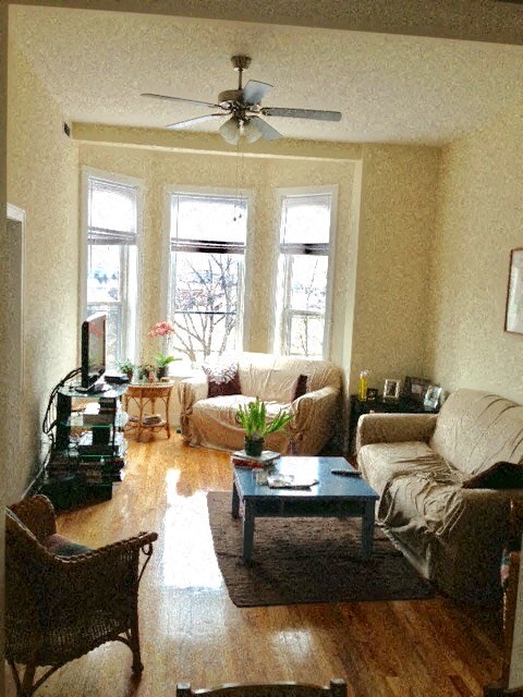 a living room with couches and a coffee table