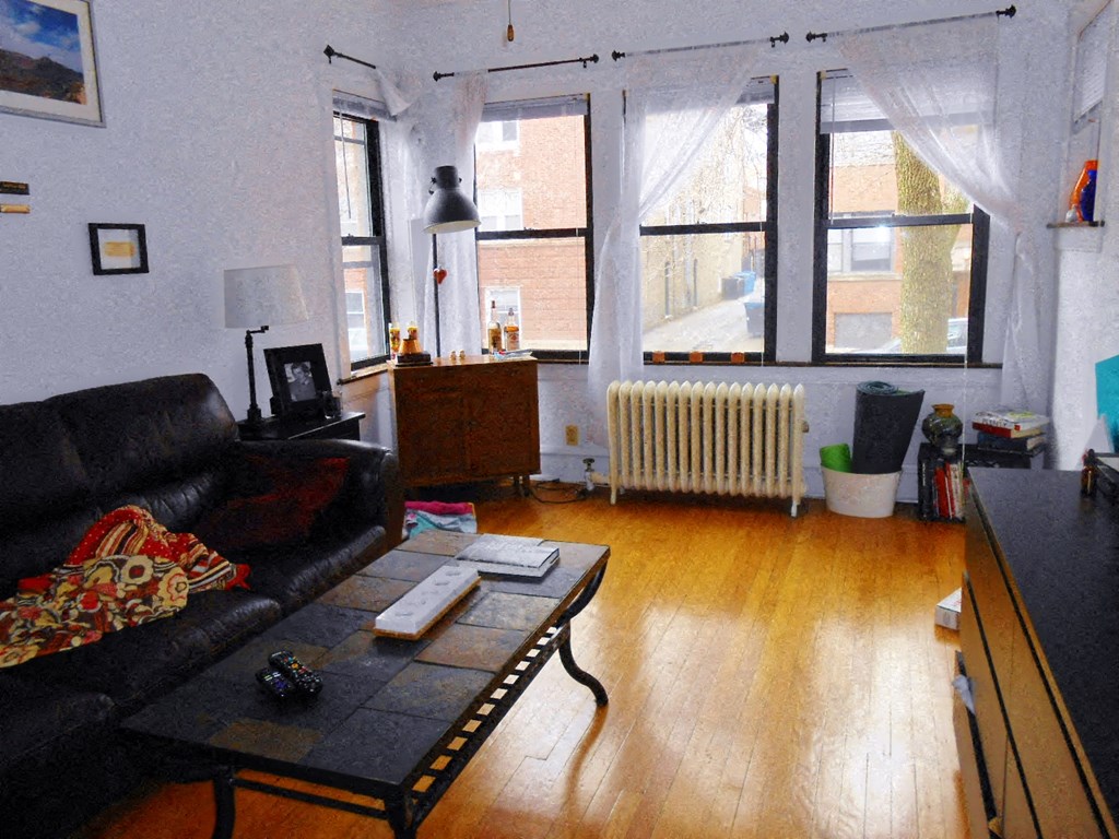 a living room with a couch and a coffee table
