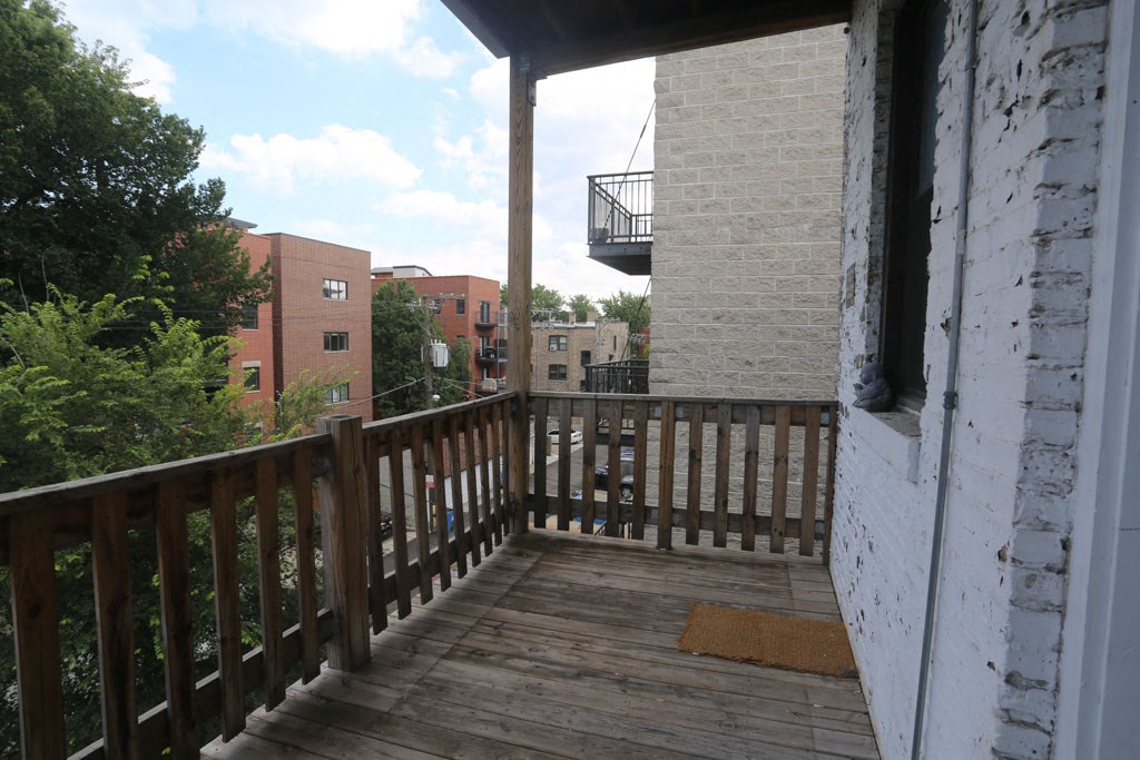 the view from the balcony of the apartment building