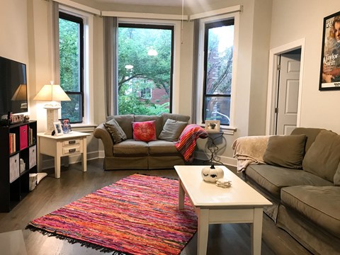 a living room with couches and a coffee table