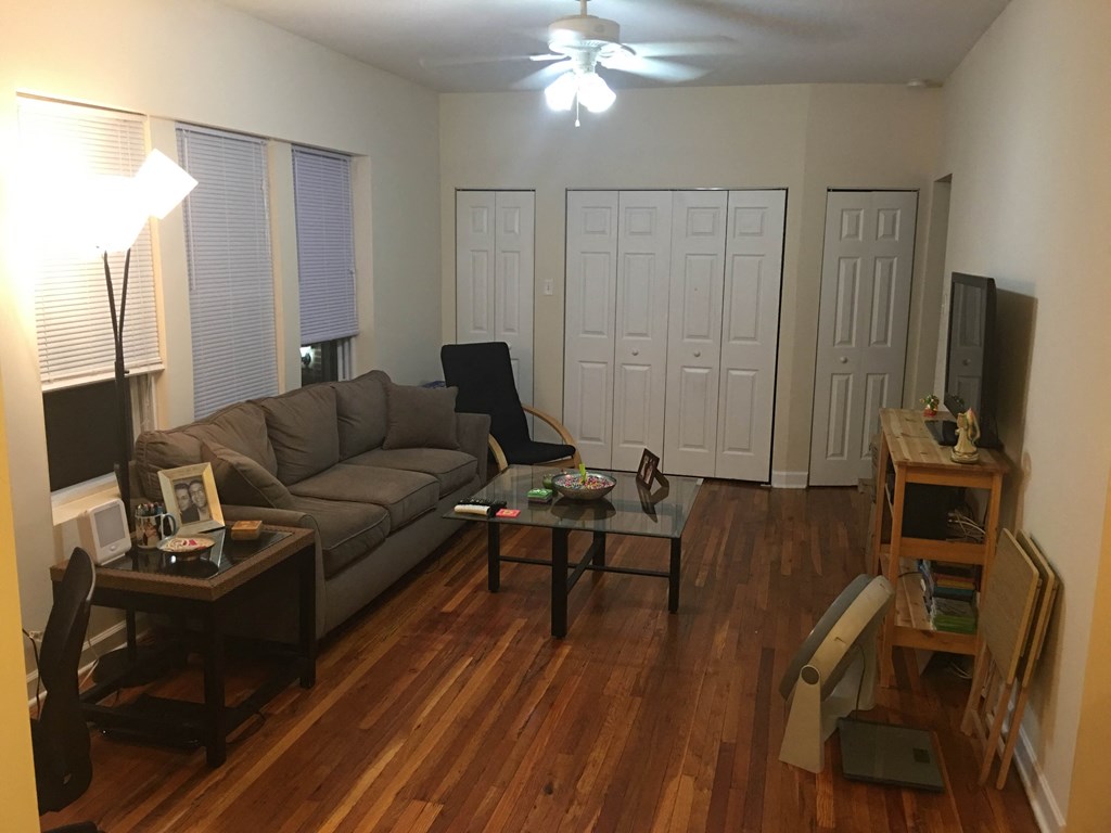 a living room with a couch and a table