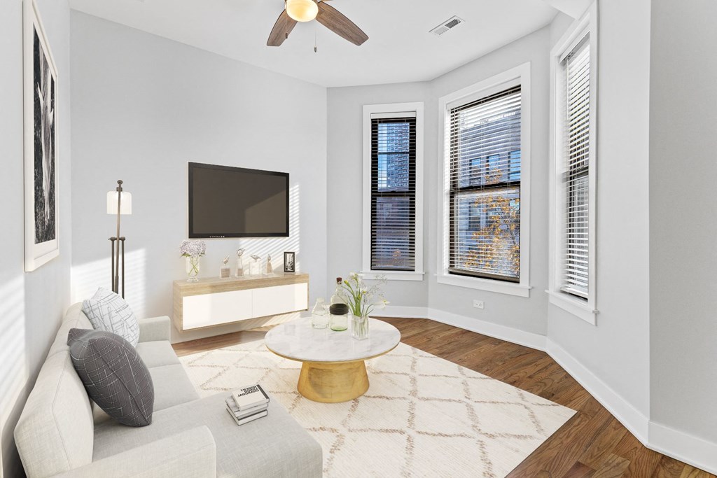 a living room with a couch and a tv