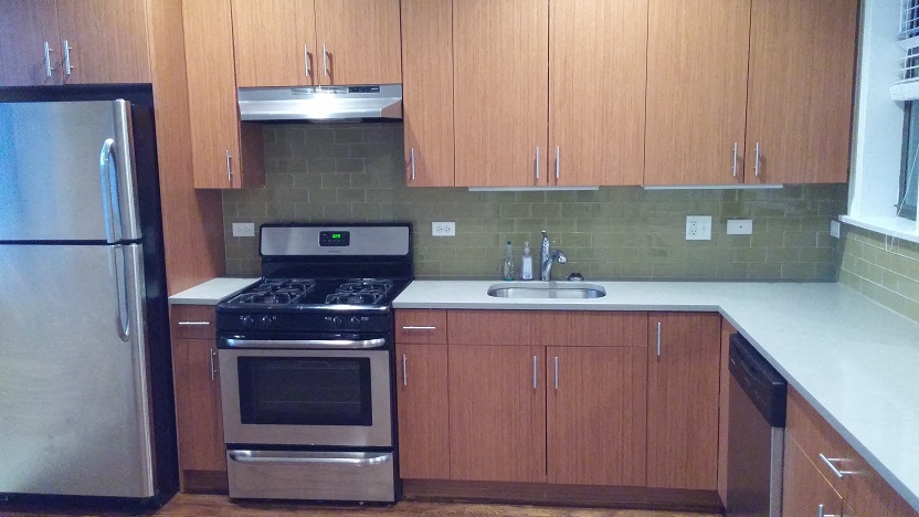a kitchen with a stove and a sink