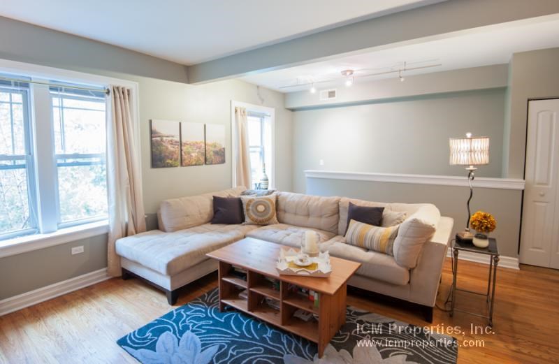 a living room with a couch and a coffee table