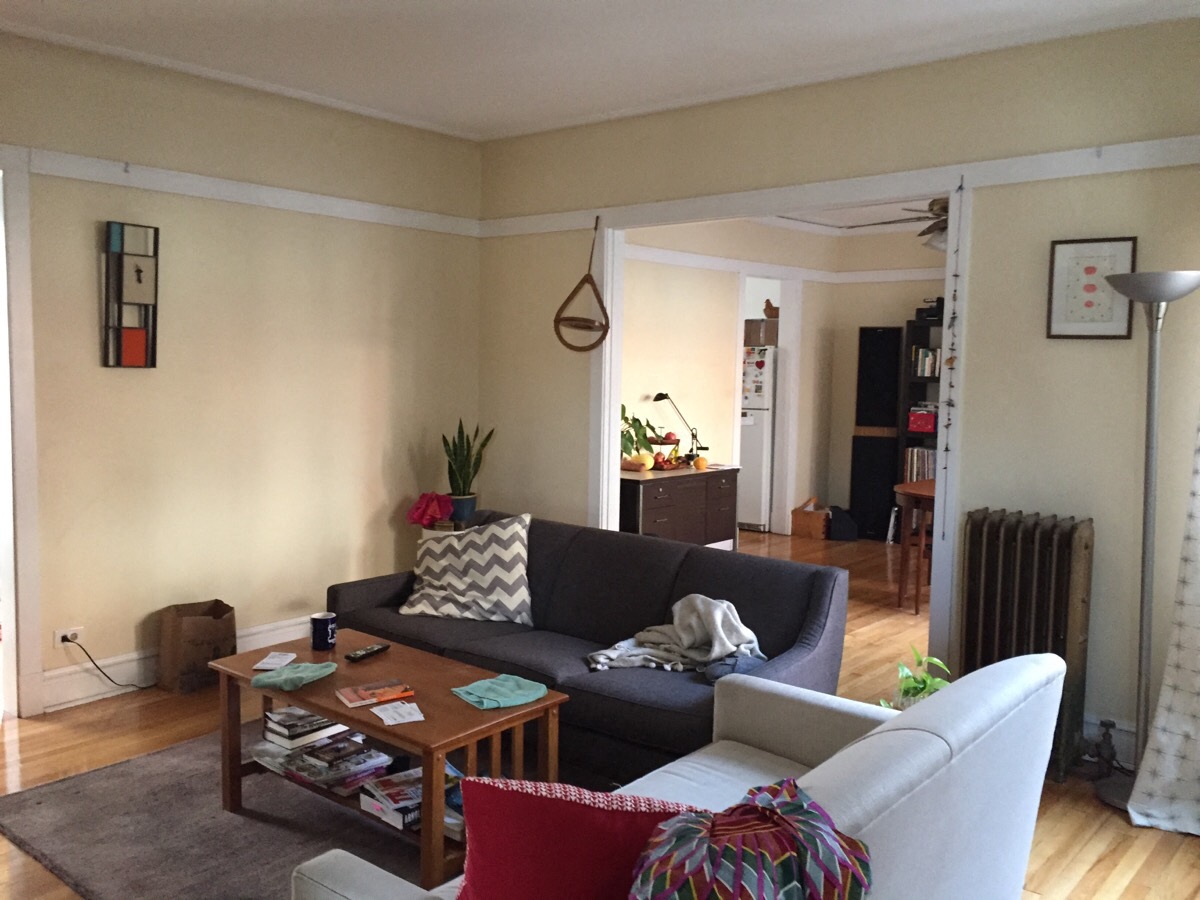 a living room with a couch and a coffee table
