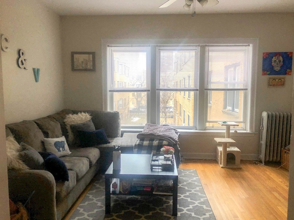 a living room with a couch and a coffee table