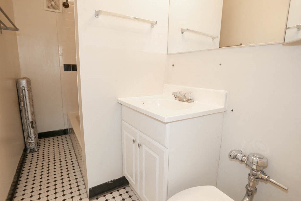 a bathroom with a sink and a toilet