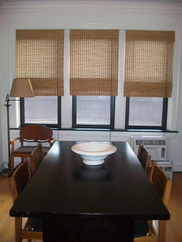 a dining room table with a bowl on top of it