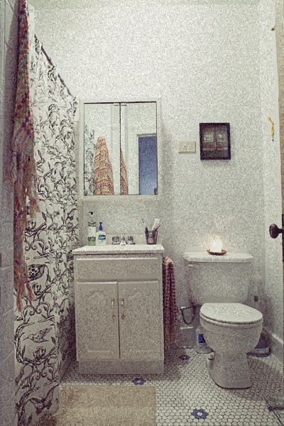 a small bathroom with a toilet and a sink