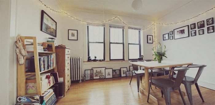 a dining room with a table and chairs