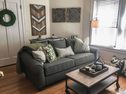a living room with a couch and a coffee table
