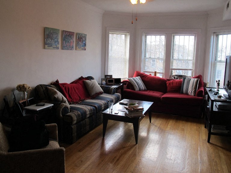 a living room with couches and a coffee table