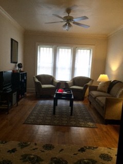 a living room with couches and a coffee table