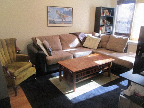 a living room with a couch and a coffee table
